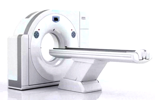 図１：CT装置　CTは、このような巨大なドーナツのような装置です。真中の穴の部分には、移動式の寝台があり、仰向けに寝て撮影されます。